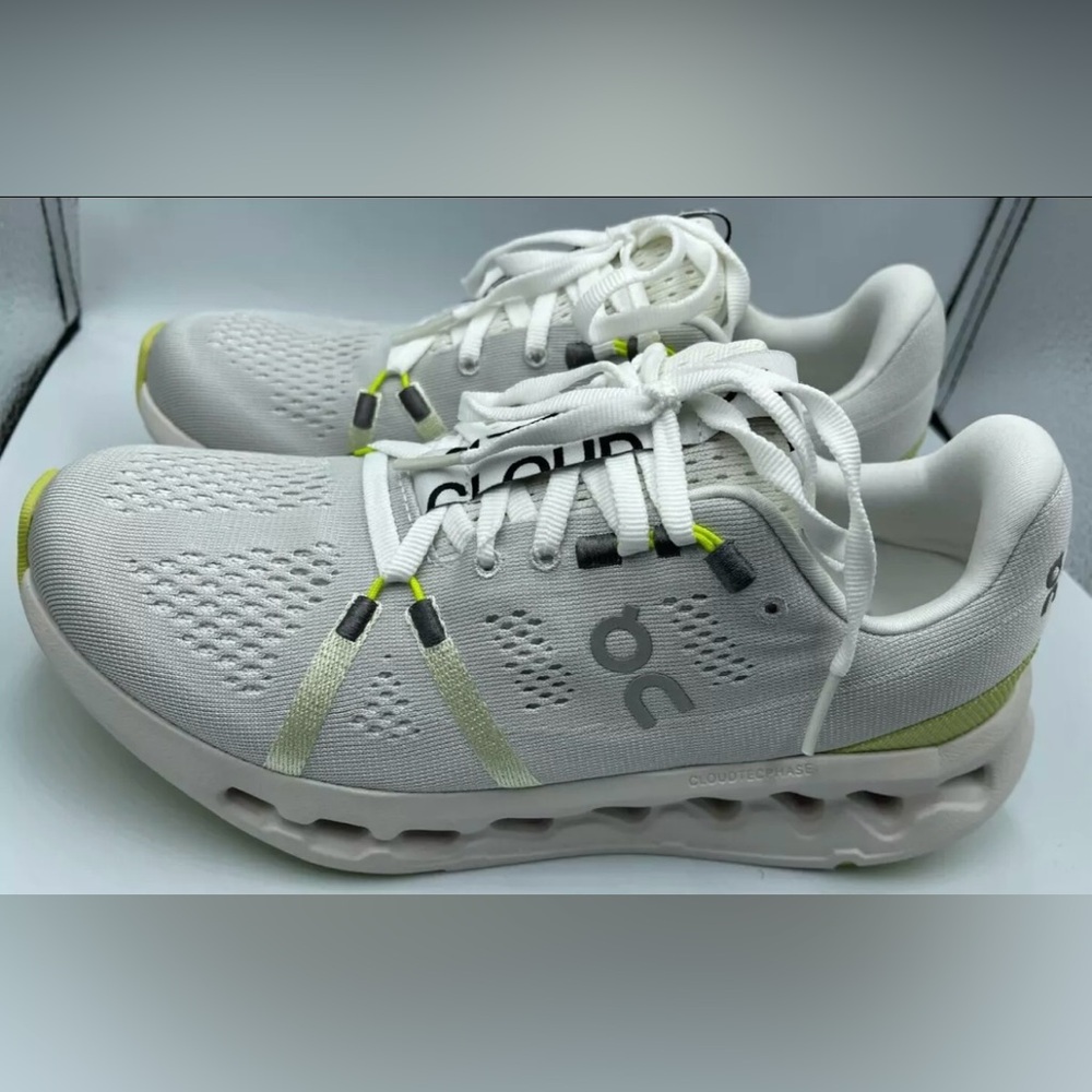 On Running White and Gray Athletic Shoes
